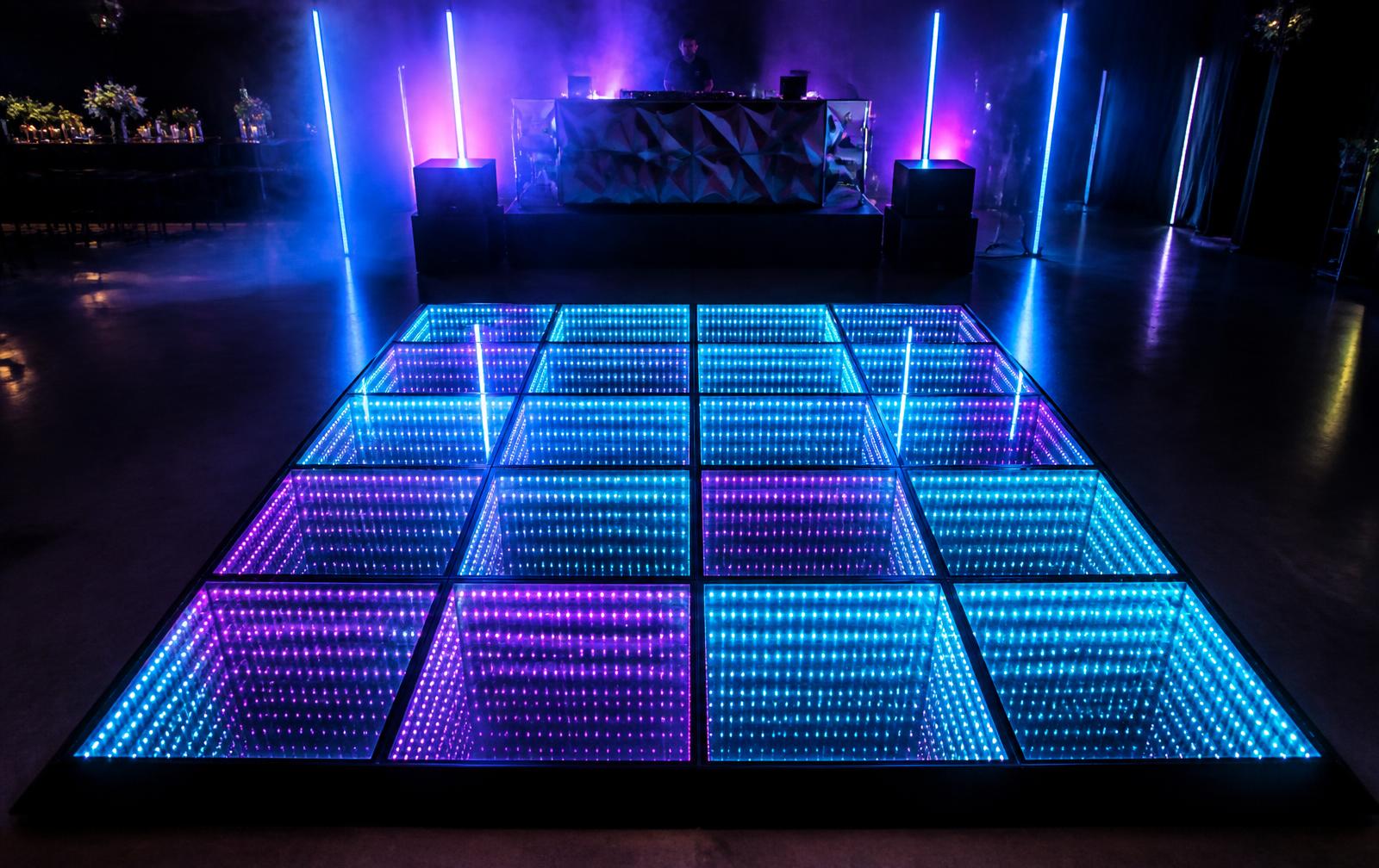 3m x 3m 3D infinity LED dance floor glowing blue and purple at a Perth event
